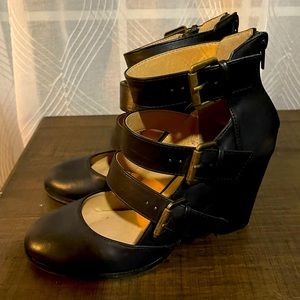Black triple strap Mary Jane heels